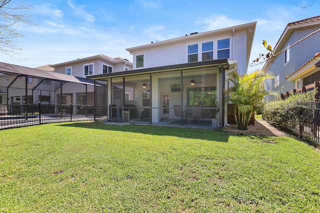 14241 Natures Reserve Dr, Lithia, FL 33547 - rear view of property featuring a ceiling fan, stucco siding, and a patio area