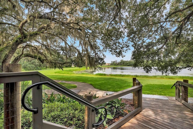 14241 Natures Reserve Dr, Lithia, FL 33547 - wooden deck featuring a water view and a lawn