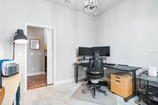 14241 Natures Reserve Dr, Lithia, FL 33547 - home office featuring a chandelier, carpet flooring, and baseboards