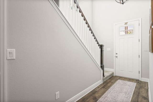 14241 Natures Reserve Dr, Lithia, FL 33547 - entryway featuring stairs, baseboards, and dark wood-style floors