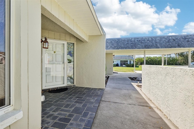 3252 Scorecard Dr, New Port Richey, FL 34655 - property entrance with a shingled roof
