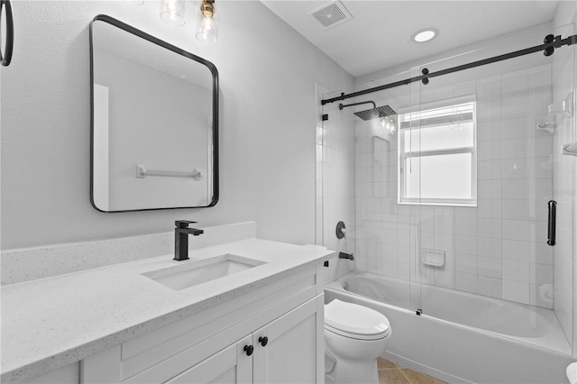 10108 36th Ct E, Parrish, FL 34219 - bathroom featuring vanity, shower / bath combination with glass door, and tile patterned flooring
