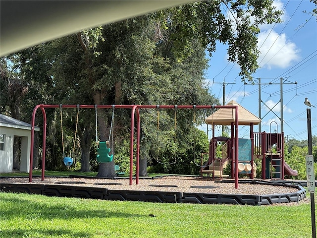 10108 36th Ct E, Parrish, FL 34219 - communal playground featuring a yard