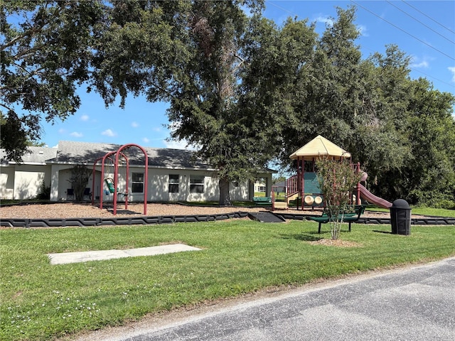 10108 36th Ct E, Parrish, FL 34219 - view of front of home with a front lawn