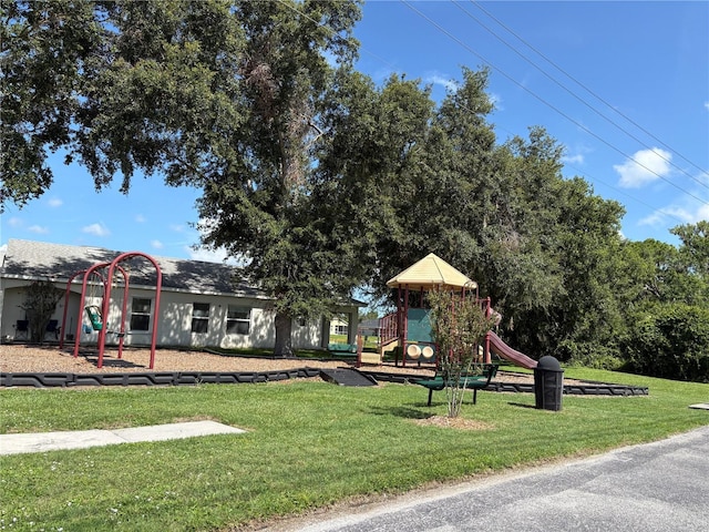 10108 36th Ct E, Parrish, FL 34219 - community play area featuring a yard