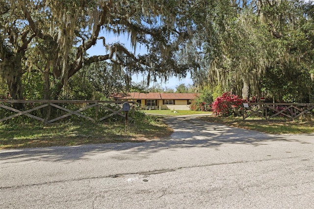 9825 Casey Dr, New Port Richey, FL 34654 - view of front of home featuring fence