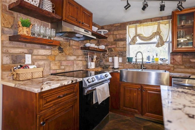 9825 Casey Dr, New Port Richey, FL 34654 - kitchen featuring stainless steel appliances, under cabinet range hood, a sink, and open shelves