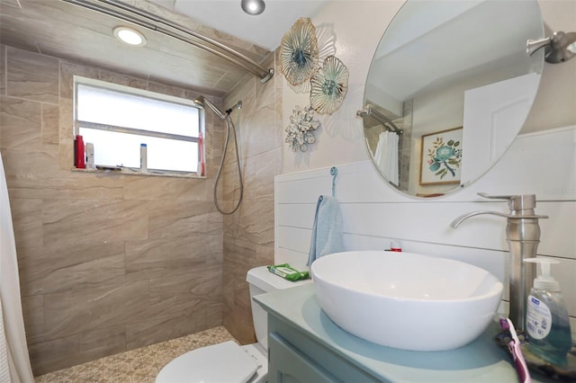 9825 Casey Dr, New Port Richey, FL 34654 - bathroom with toilet, vanity, and tiled shower