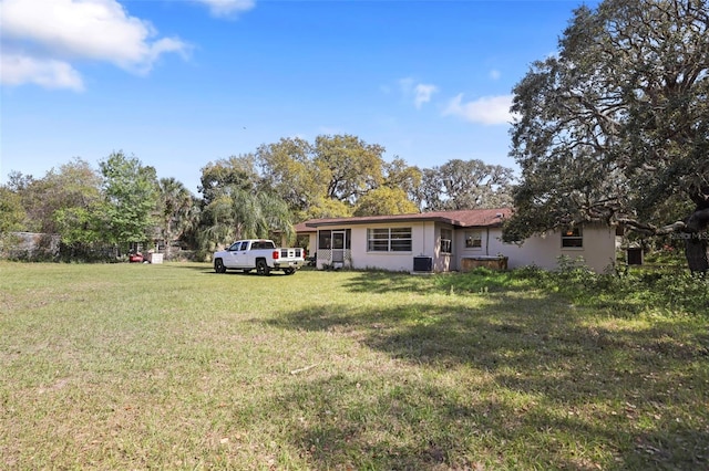 9825 Casey Dr, New Port Richey, FL 34654 - view of yard featuring central AC unit