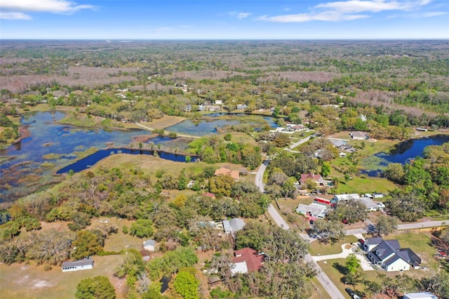 9825 Casey Dr, New Port Richey, FL 34654 - bird's eye view with a water view and a view of trees