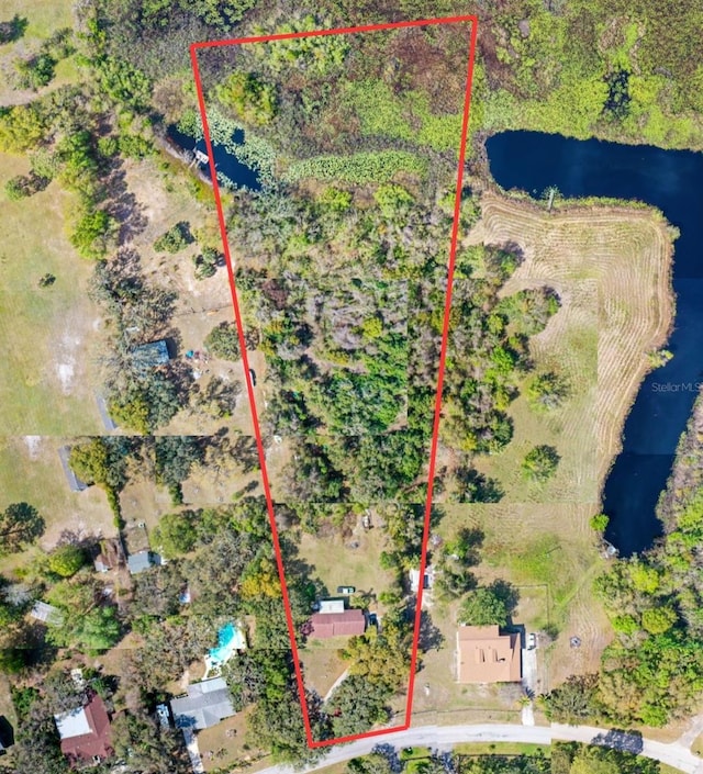 9825 Casey Dr, New Port Richey, FL 34654 - birds eye view of property featuring a water view