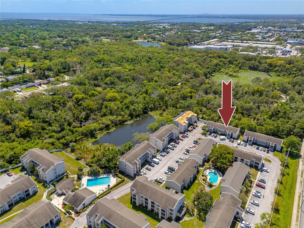 2625 State Road 590 Unit 923, Clearwater, FL 33759 - birds eye view of property with a water view and a wooded view