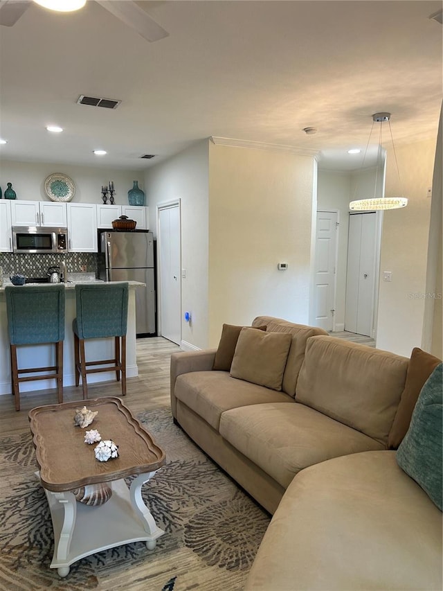 2220 Chianti Pl Unit 8-0817, Palm Harbor, FL 34683 - living area with light wood-type flooring and recessed lighting