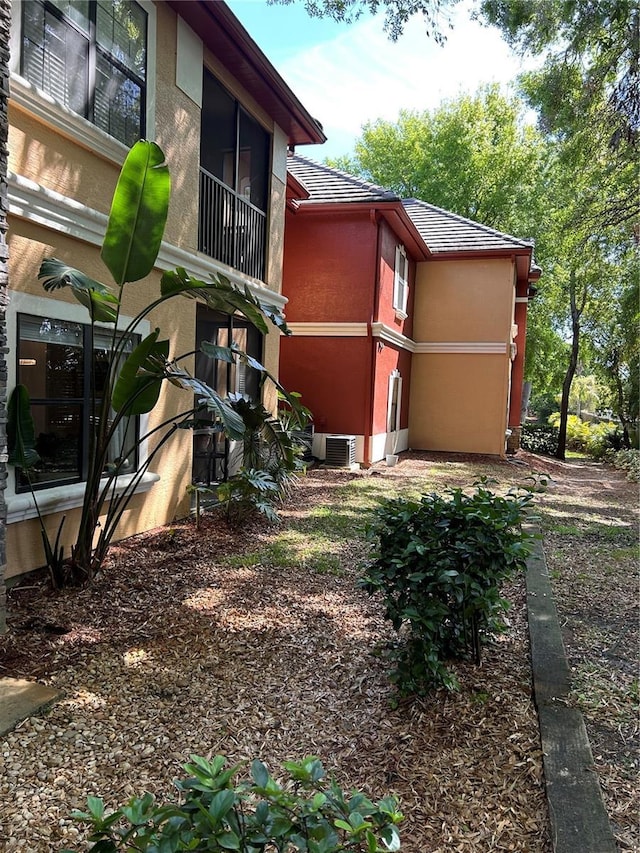 2220 Chianti Pl Unit 8-0817, Palm Harbor, FL 34683 - view of side of home with stucco siding