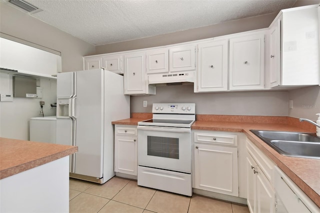 kitchen featuring white cabinetry, white appliances, under cabinet range hood, a sink, and visible vents