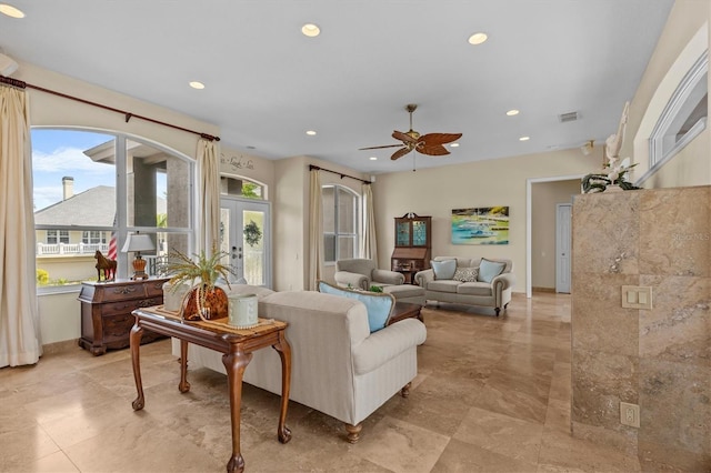 2050 N Pointe Alexis Dr, Tarpon Springs, FL 34689 - living room featuring french doors, a ceiling fan, baseboards, visible vents, and recessed lighting