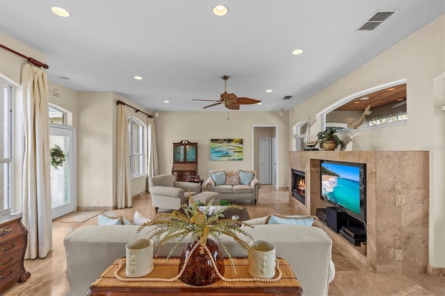 2050 N Pointe Alexis Dr, Tarpon Springs, FL 34689 - living room with visible vents, ceiling fan, recessed lighting, and a fireplace