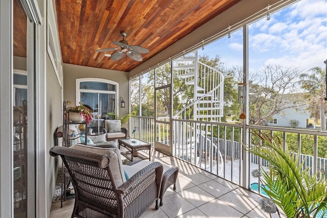 2050 N Pointe Alexis Dr, Tarpon Springs, FL 34689 - sunroom with a ceiling fan and an outdoor living space