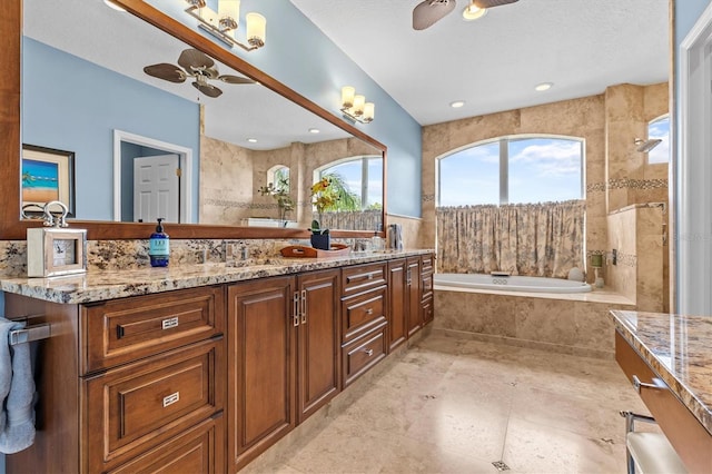 2050 N Pointe Alexis Dr, Tarpon Springs, FL 34689 - full bathroom featuring a bath, double vanity, ceiling fan, and a sink