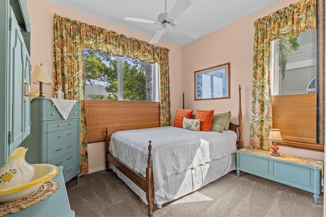 2050 N Pointe Alexis Dr, Tarpon Springs, FL 34689 - bedroom featuring dark carpet and a ceiling fan