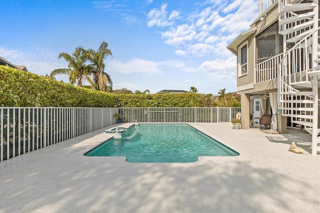 2050 N Pointe Alexis Dr, Tarpon Springs, FL 34689 - view of swimming pool with a fenced in pool, a fenced backyard, stairway, an in ground hot tub, and a patio area