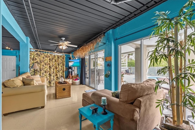 2050 N Pointe Alexis Dr, Tarpon Springs, FL 34689 - interior space with an outdoor living space, speckled floor, and a ceiling fan