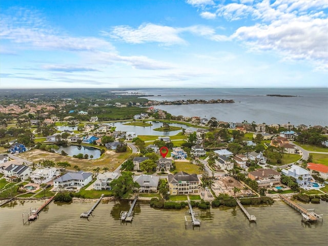2050 N Pointe Alexis Dr, Tarpon Springs, FL 34689 - drone / aerial view with a residential view and a water view