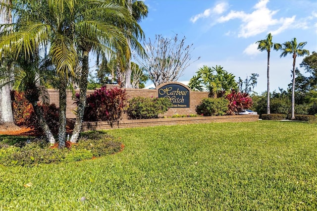 2050 N Pointe Alexis Dr, Tarpon Springs, FL 34689 - community sign featuring a lawn