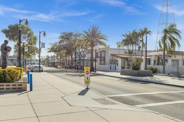 2050 N Pointe Alexis Dr, Tarpon Springs, FL 34689 - view of road with sidewalks, street lighting, traffic signs, and curbs