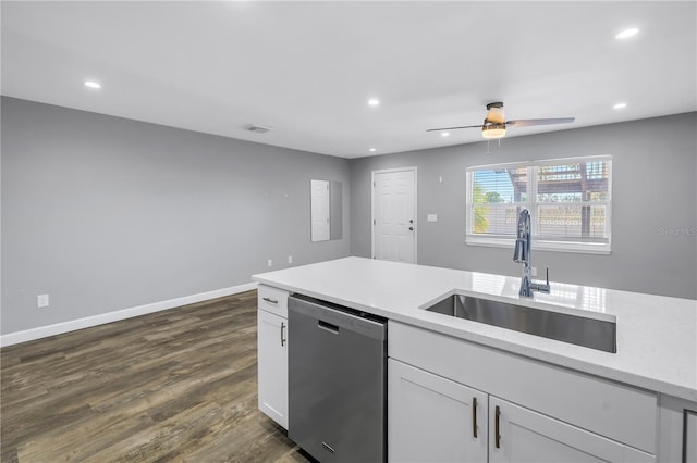 9105 W Hillsborough Ave Unit I102, Tampa, FL 33615 - kitchen featuring a sink, stainless steel dishwasher, baseboards, white cabinets, and recessed lighting