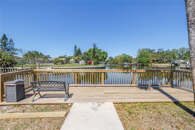 9105 W Hillsborough Ave Unit I102, Tampa, FL 33615 - dock area featuring a deck with water view