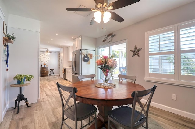 8326 Archwood Cir, Tampa, FL 33615 - dining space featuring baseboards, ceiling fan, recessed lighting, and light wood-style floors