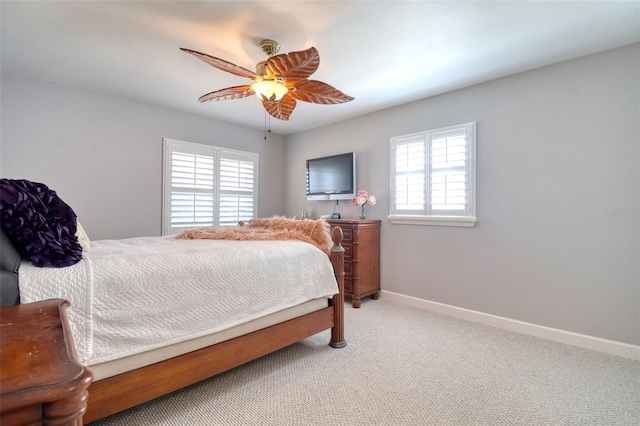 8326 Archwood Cir, Tampa, FL 33615 - bedroom with baseboards, carpet flooring, and a ceiling fan