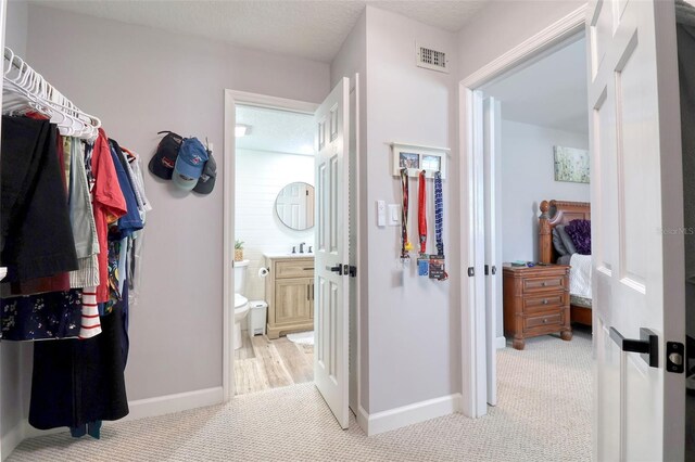 8326 Archwood Cir, Tampa, FL 33615 - interior space with visible vents and light colored carpet