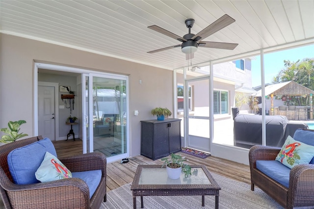 8326 Archwood Cir, Tampa, FL 33615 - sunroom with a ceiling fan