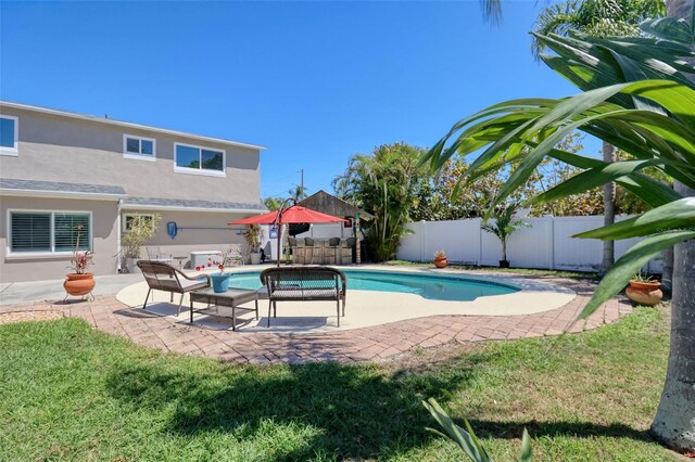 8326 Archwood Cir, Tampa, FL 33615 - view of swimming pool with a fenced backyard, a yard, a patio area, and a fenced in pool