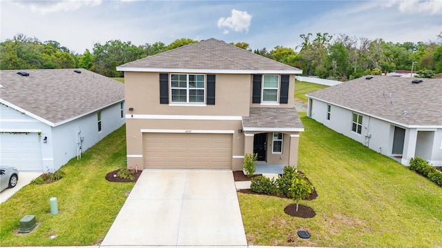 traditional home with stucco siding, driveway, a front yard, a garage, and a shingled roof