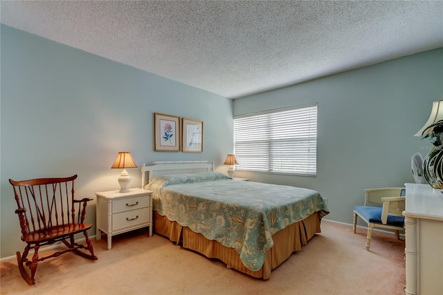 14130 Rosemary Ln Unit 3312, Largo, FL 33774 - bedroom featuring light colored carpet, baseboards, and a textured ceiling