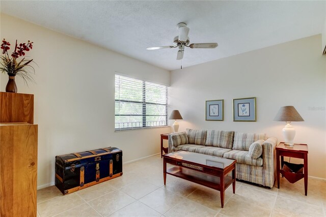 14130 Rosemary Ln Unit 3312, Largo, FL 33774 - tiled living room with baseboards and ceiling fan