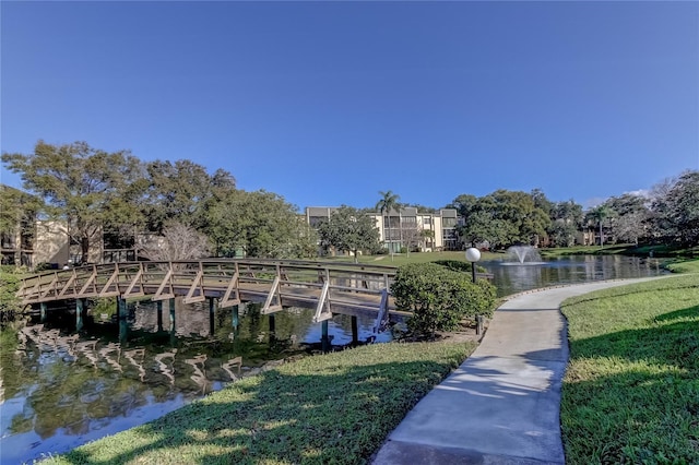 14130 Rosemary Ln Unit 3312, Largo, FL 33774 - view of community featuring a water view and a yard