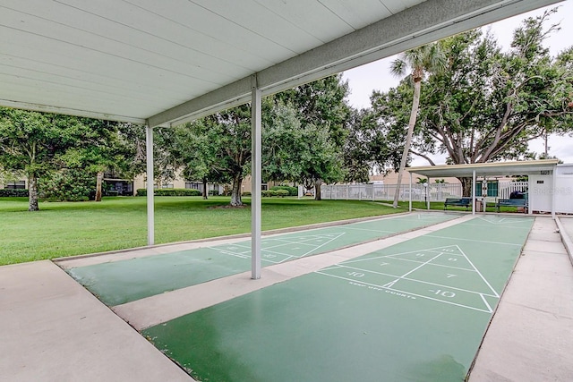 14130 Rosemary Ln Unit 3312, Largo, FL 33774 - view of community featuring fence, shuffleboard, and a yard
