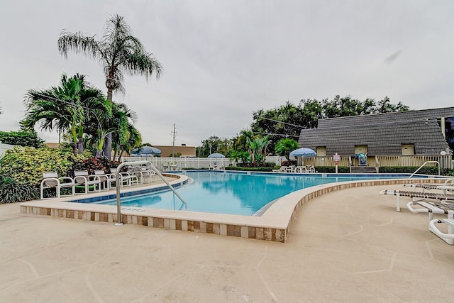 14130 Rosemary Ln Unit 3312, Largo, FL 33774 - pool with fence and a patio area