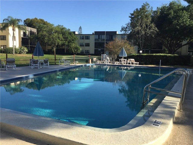 14130 Rosemary Ln Unit 3312, Largo, FL 33774 - pool featuring a yard and a patio area