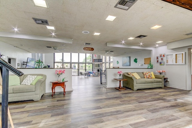14130 Rosemary Ln Unit 3312, Largo, FL 33774 - living area with visible vents, a ceiling fan, and wood finished floors