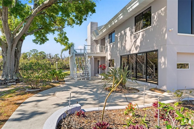 7049 Peninsular Dr, New Port Richey, FL 34652 - view of community with stairway