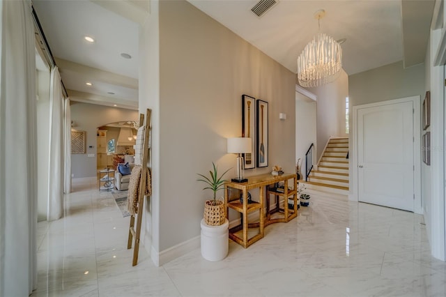 362 41st Ave, St Pete Beach, FL 33706 - corridor featuring visible vents, a chandelier, marble finish floor, recessed lighting, and stairway