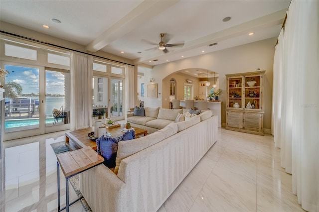 362 41st Ave, St Pete Beach, FL 33706 - living area featuring beam ceiling, arched walkways, ceiling fan, and recessed lighting