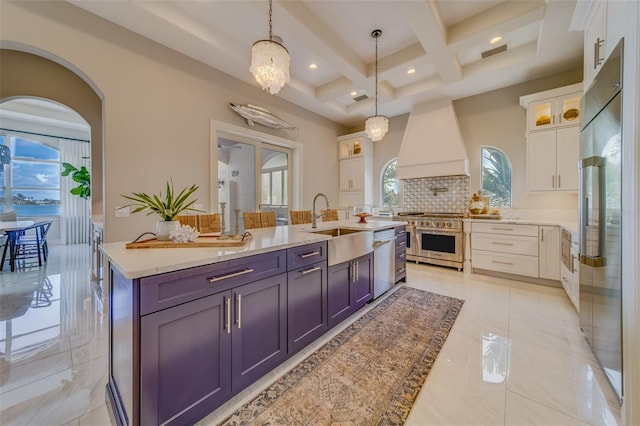 362 41st Ave, St Pete Beach, FL 33706 - kitchen featuring coffered ceiling, white cabinetry, premium appliances, visible vents, and custom range hood