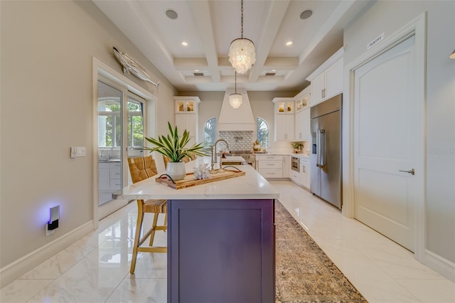 362 41st Ave, St Pete Beach, FL 33706 - kitchen with baseboards, marble finish floor, stainless steel built in fridge, and coffered ceiling