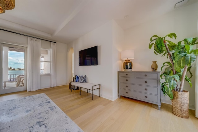 362 41st Ave, St Pete Beach, FL 33706 - living area with baseboards, a water view, and wood finished floors